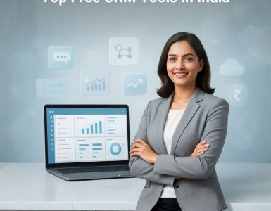 Businesswoman standing beside a laptop displaying CRM dashboards and analytics, representing the best free CRM software in India.