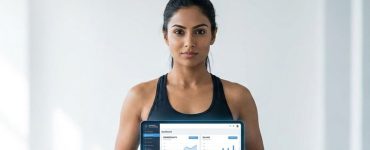 Fitness model viewing Picky Assist gym management software dashboard showing automated memberships and billing on a light background